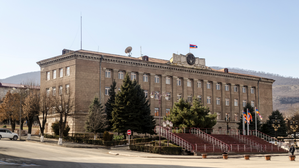 a building with a flag on top